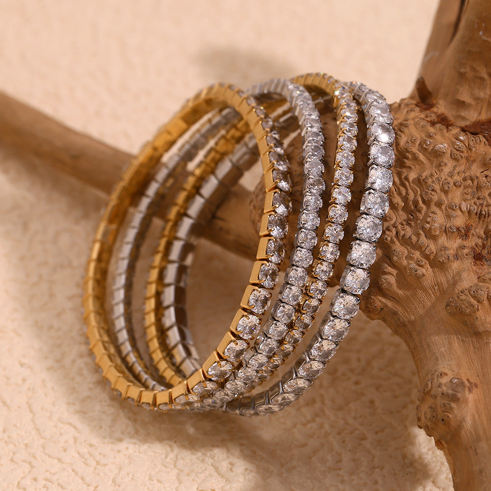 Elegante bracciale elastico da donna con strass, in acciaio inossidabile placcato oro 18 carati con forme geometriche