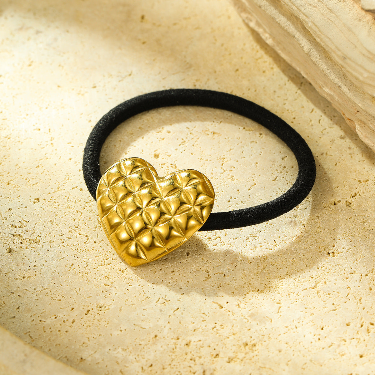 Fermacoda a forma di cuore e girasole in acciaio e titanio minimalista con finitura placcata per coda bassa, accessorio moda ad alta elasticità