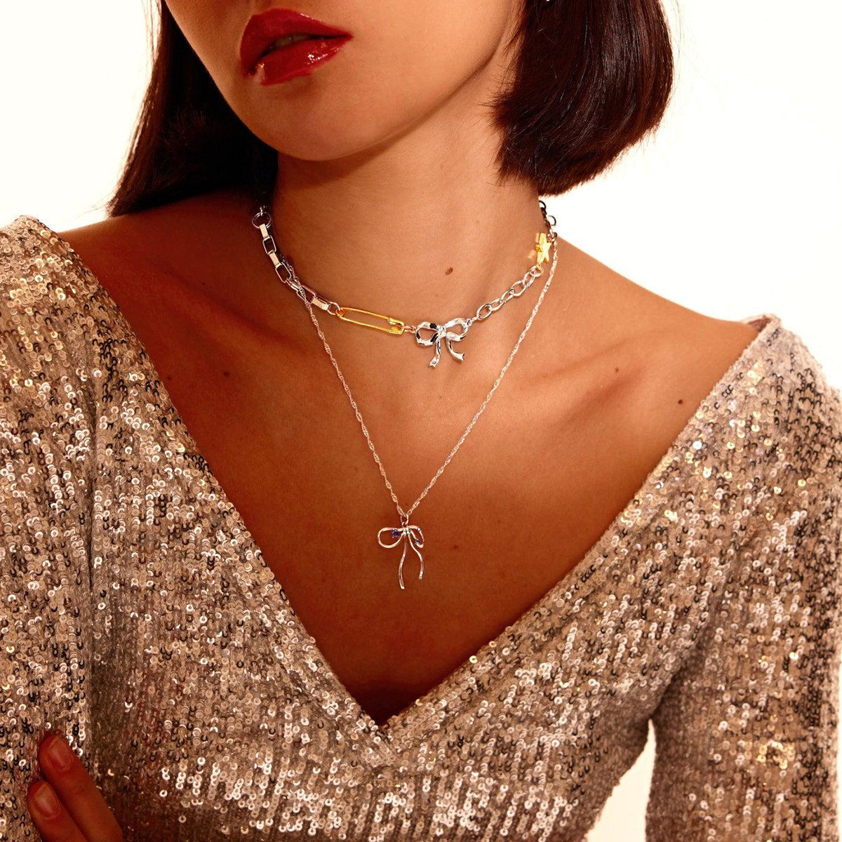 Collana con Pendente a Fiocco in Acciaio Inossidabile Bicolore alla Moda da Donna
