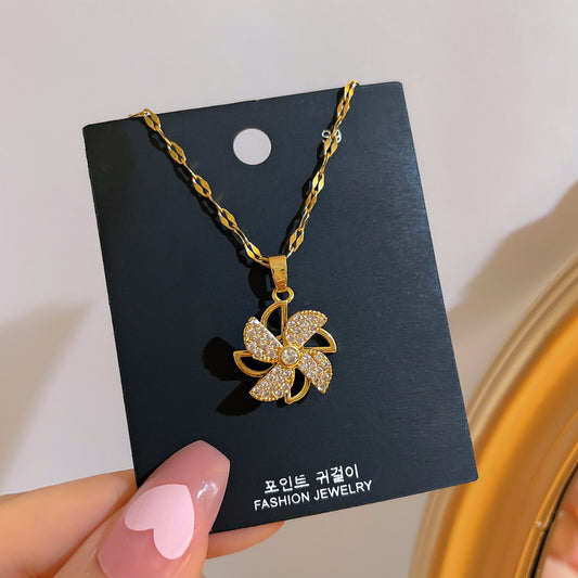 Rotating Windmill Pendant Necklace for Women with Hollow Design and Full Rhinestone Accents in Titanium Steel, Minimalist Geometric Style Locket Chain