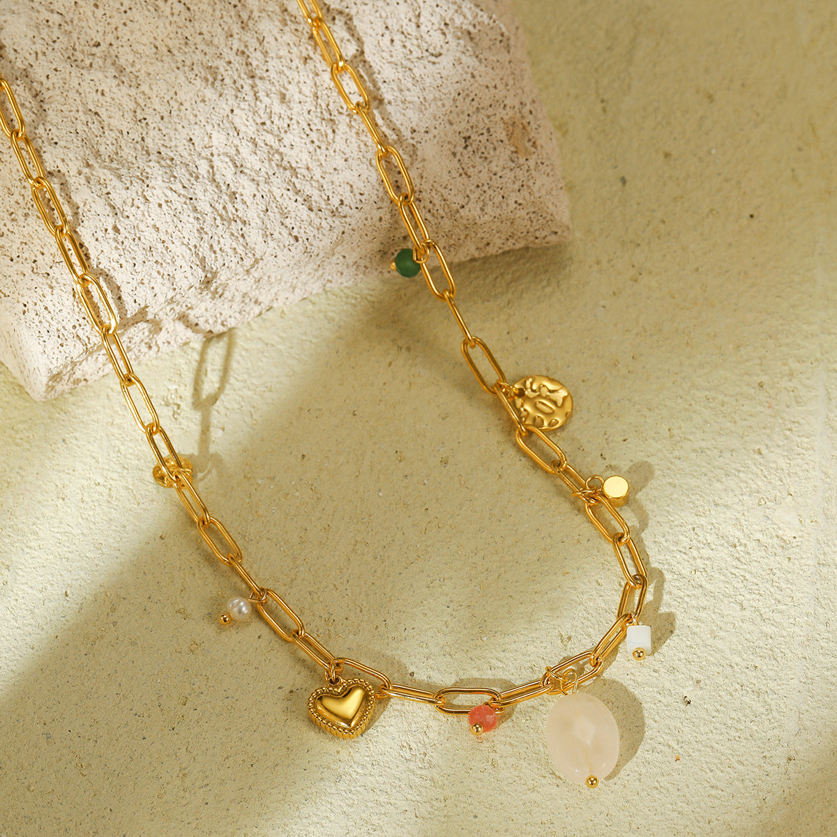 Fashionable Heart-Shaped Titanium Steel Necklace for Women with Natural Pearl Accents and Electroplated Finish
