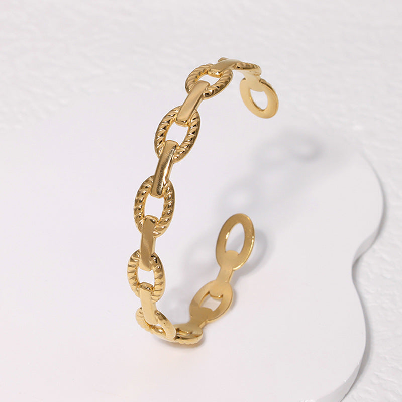 Brazalete geométrico de acero inoxidable con acabado de acero de titanio, galvanizado para una elegancia que no se desvanece, accesorio diario moderno y sofisticado