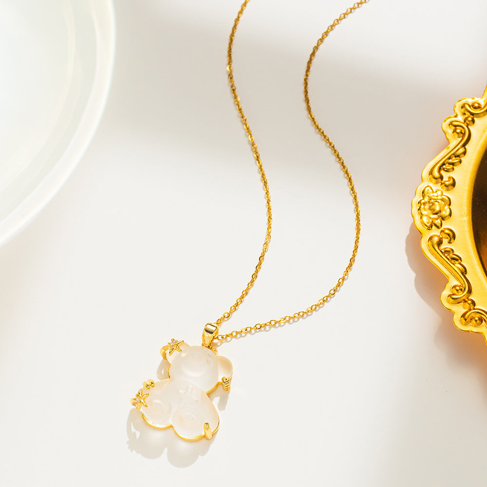 Collana pendente minimalista orsetto e stella da donna in acciaio al titanio placcato oro con catena a maglie ovali