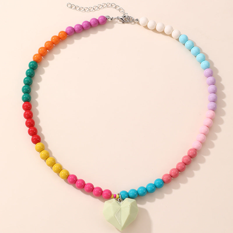 Lindo Collar de Resina con Forma de Lazo para Niñas con Acabado Pintado en Diseño Multicolor, Joyería Infantil Dulce y Juguetona