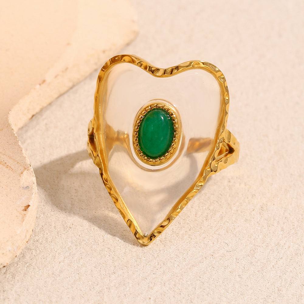 Anello da donna alla moda a forma di cuore in acciaio inossidabile placcato oro 18 carati con accento verde in acrilico trasparente