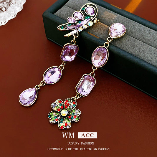Pendientes de aleación con forma de gota de agua vintage con incrustaciones de diamantes de imitación y postes de acero inoxidable para mujer