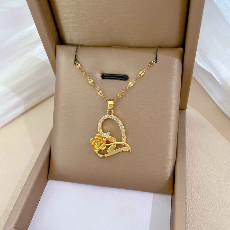 Collar con colgante de lujo elegante de circonitas con forma de corazón rosa, cadena de acero titanio para mujer y hombre