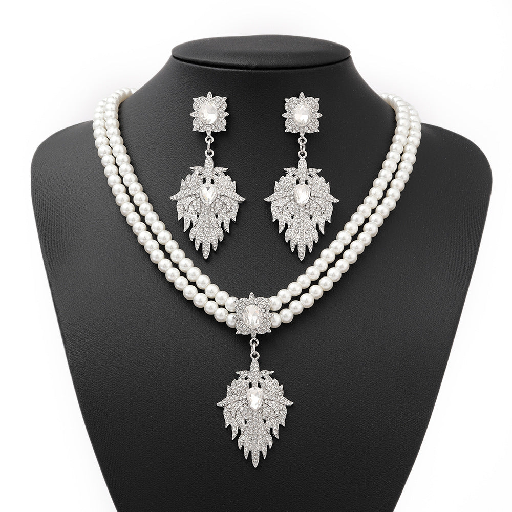 French Vintage Leaf-Shaped Imitation Pearl Necklace Earrings Bracelet Set for Women with Rhinestone Inlay and O-Chain