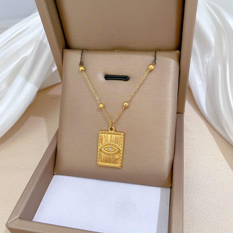 Minimalist Geometric Titanium Steel Pendant Necklace for Women and Men with Gold Plated Finish and Angular Bead Detail