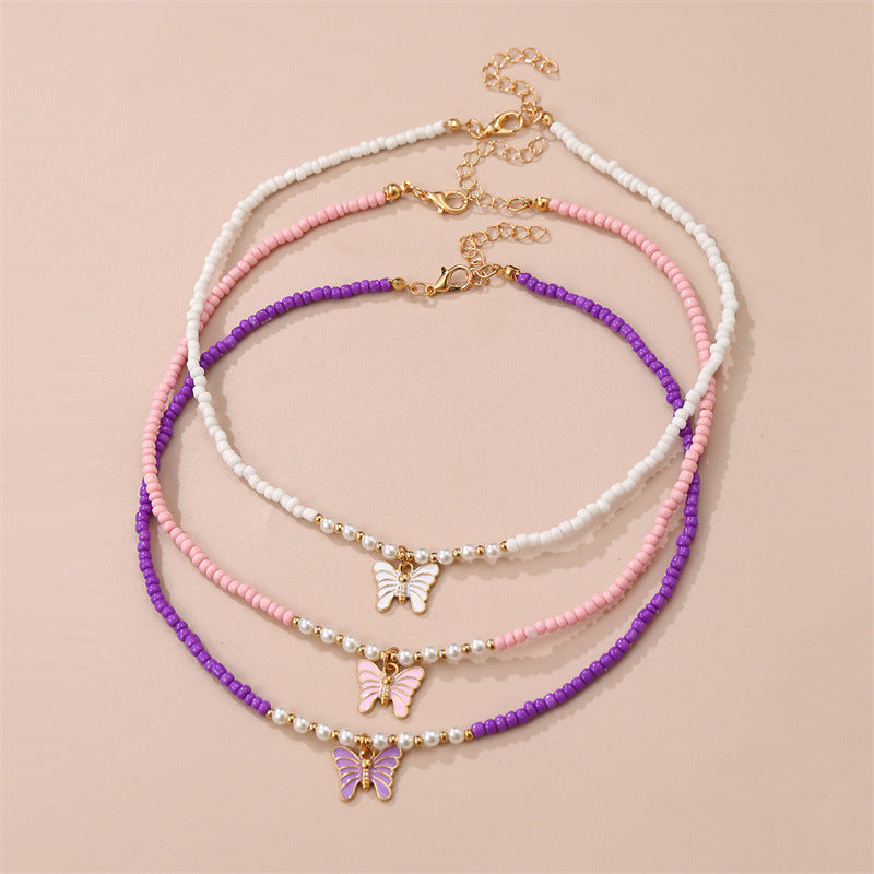 Collana con Ciondolo a Farfalla Smaltata in Stile Bohemien con Perle di Vetro per Bambini, Catenina con Perline Rotonde Fatta a Mano
