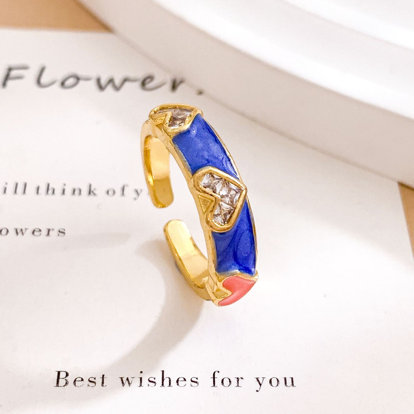 Anello regolabile da donna in ottone placcato, smaltato a goccia, con motivo floreale minimalista