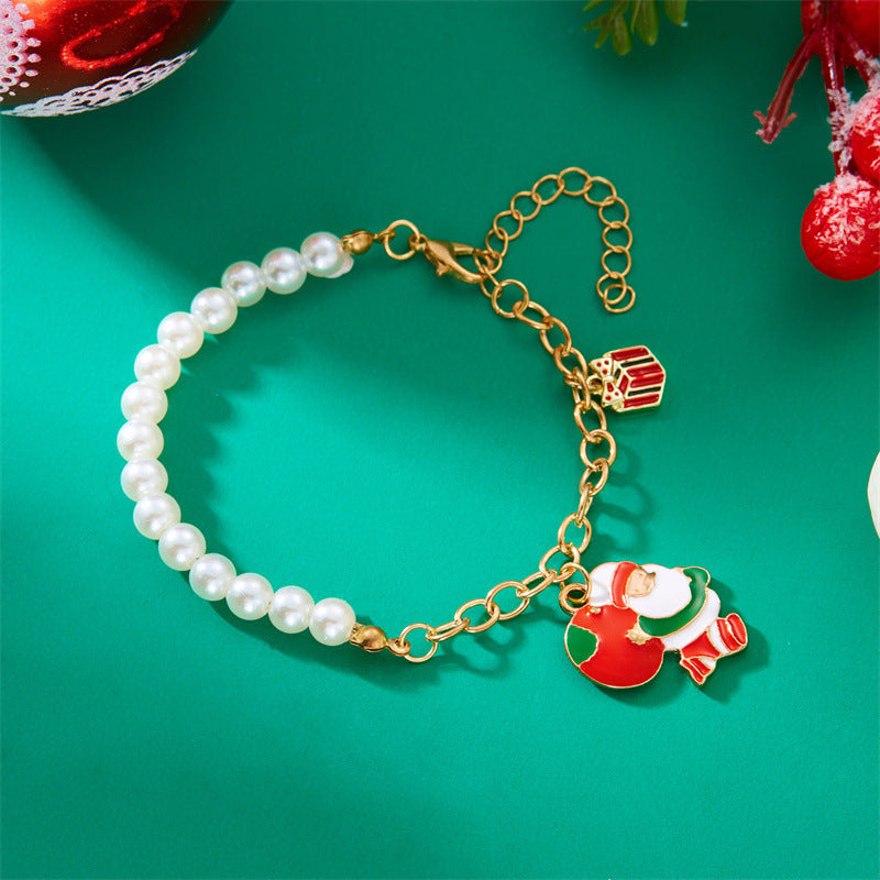 Pulsera de abalorios de Papá Noel de moda para mujer, chapada en aleación con acabado de esmalte, diseño de personaje de dibujos animados, joyería temática navideña