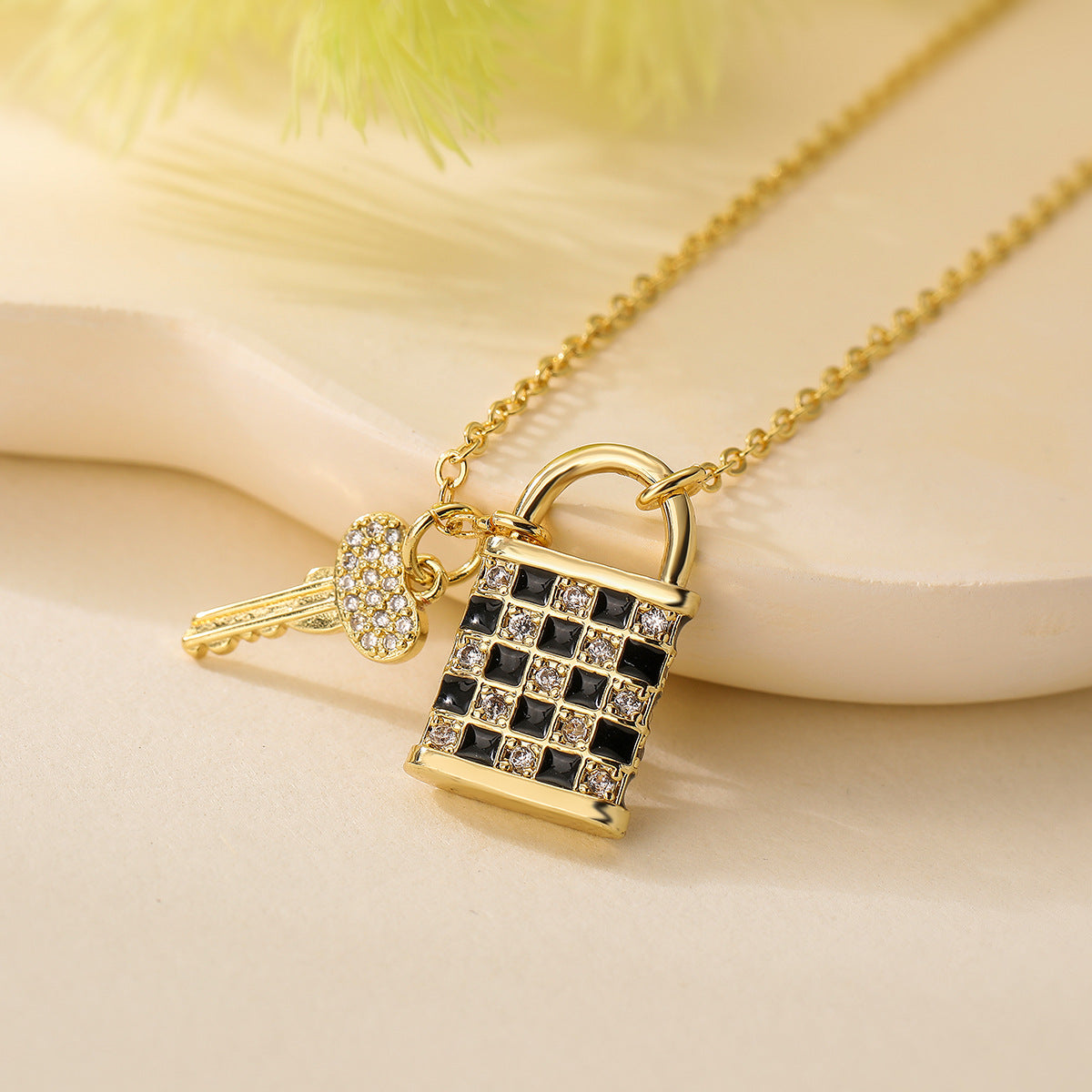 Minimalist Geometric Chessboard Pattern Enamel Key Lock Pendant Necklace for Women in Brass with 18K Gold Plating and Zircon