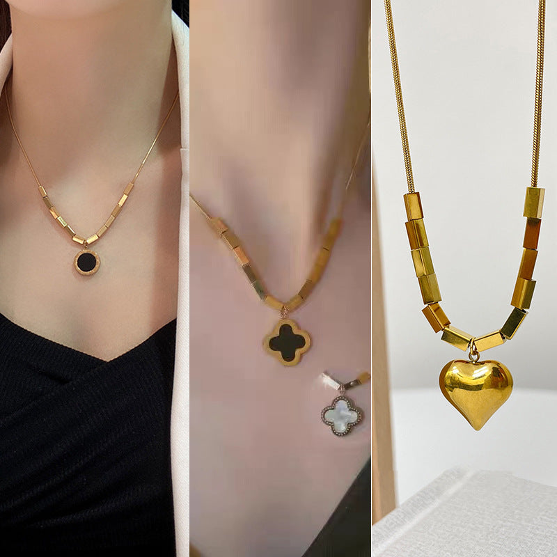 Collana girocollo con ciondolo a cuore geometrico minimalista per donna, in acciaio al titanio con catena a serpente