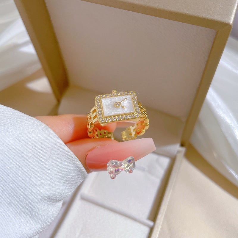 Anillo ajustable minimalista con incrustaciones de diamantes de imitación con diseño de corona para mujer, base de latón con chapado en oro