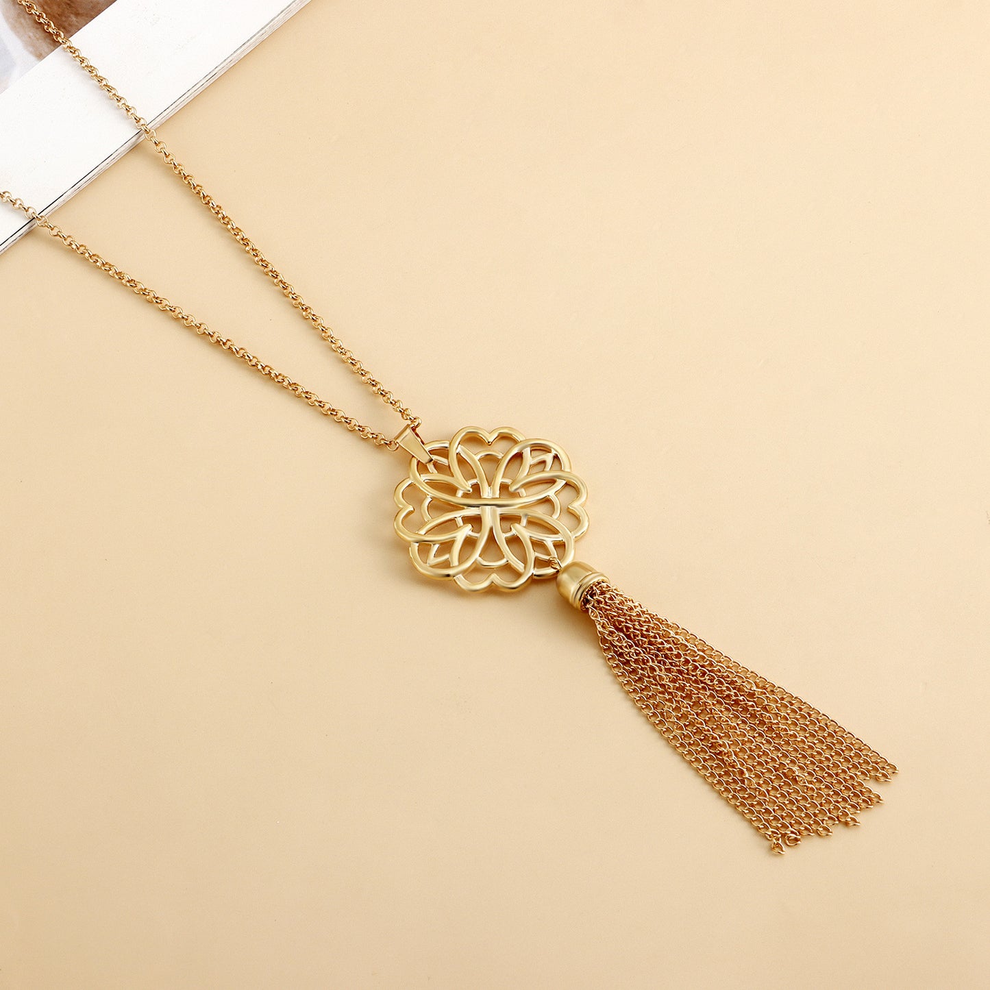 Minimalist Lotus Pendant Long Layered Necklace for Women with Hollow Design and Tassel Detail in Alloy with Plating Finish