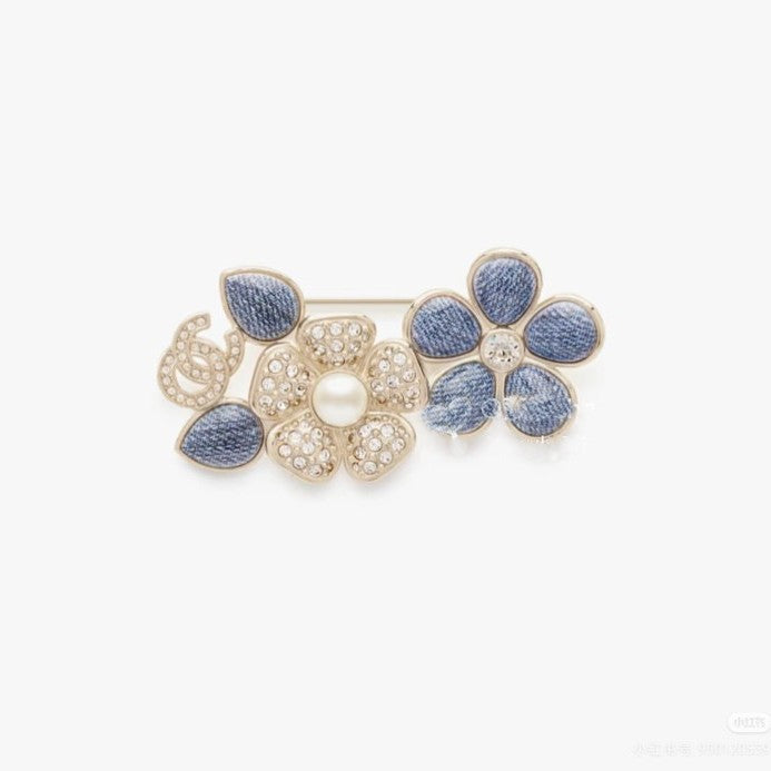 Elegante spilla da donna in ottone placcato con strass floreali
