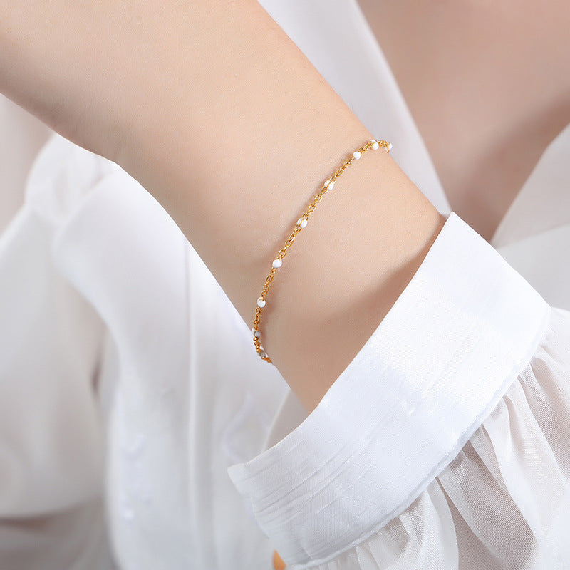 Conjunto minimalista de collar y pulsera de cadena con eslabones O de acero de titanio y detalles de esmalte para mujer