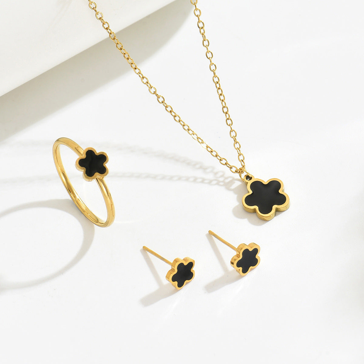 Floral Clover Geometric Pendant Necklace Set with Earrings and Bracelet for Women in Copper with Micro-Pave Setting