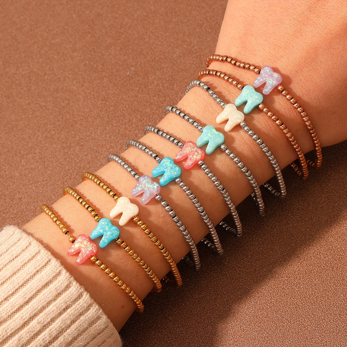 Bracciale da donna in acciaio inossidabile placcato oro 18 carati a forma di dente colorato