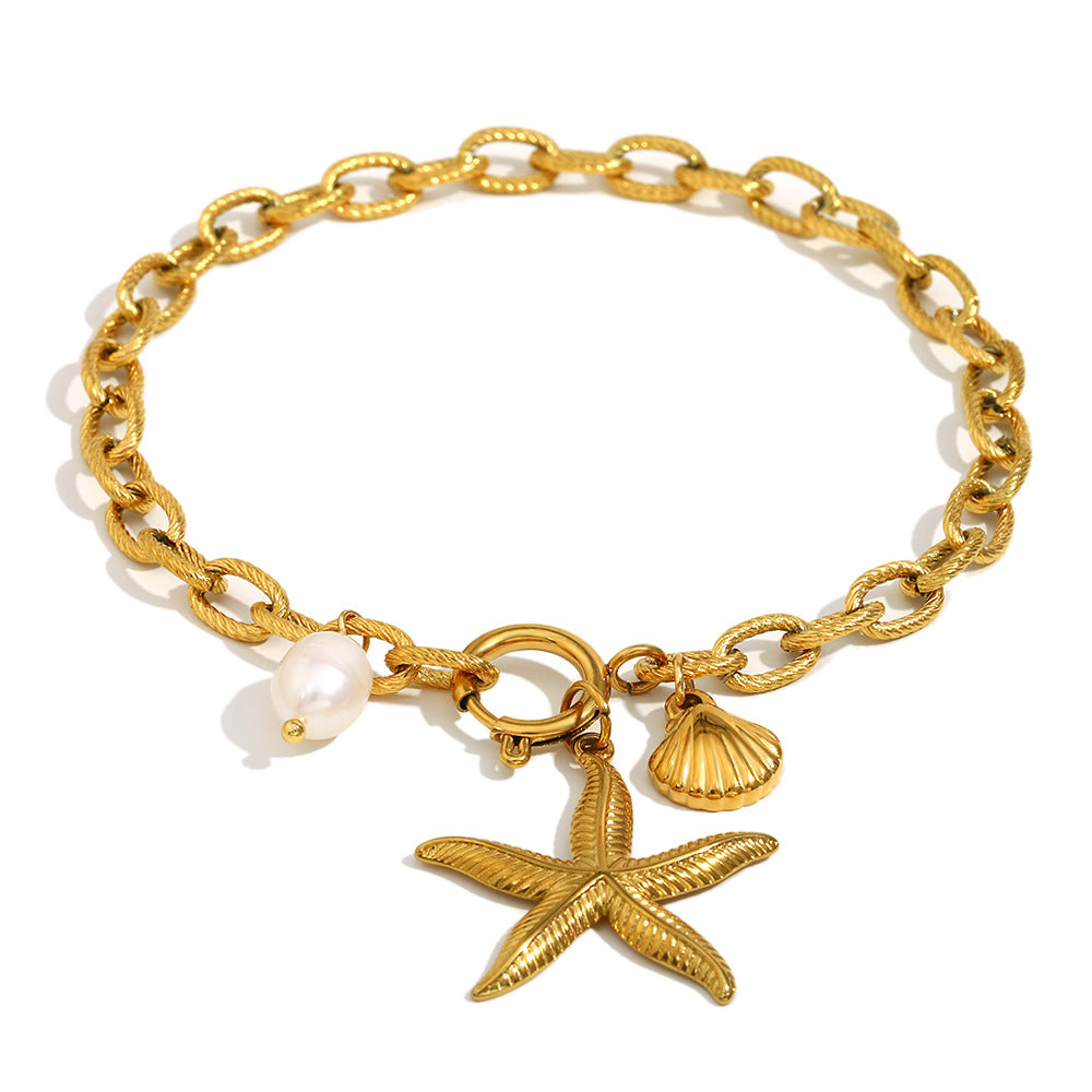 Cavigliera minimalista a forma di stella in acciaio inossidabile placcato oro 18 carati con accenti di perle da donna