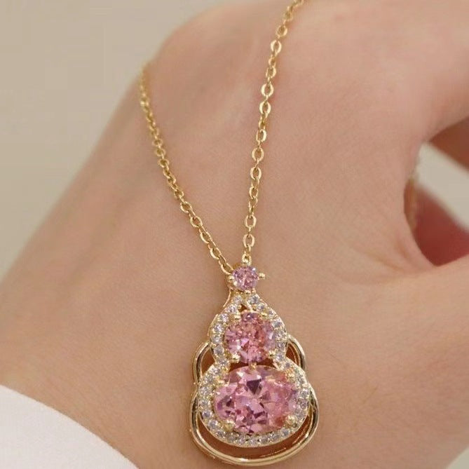 Minimalist Pink Crystal Gourd Pendant Necklace in Titanium Steel with Gold Plating on O-Chain for Women and Unisex Wear