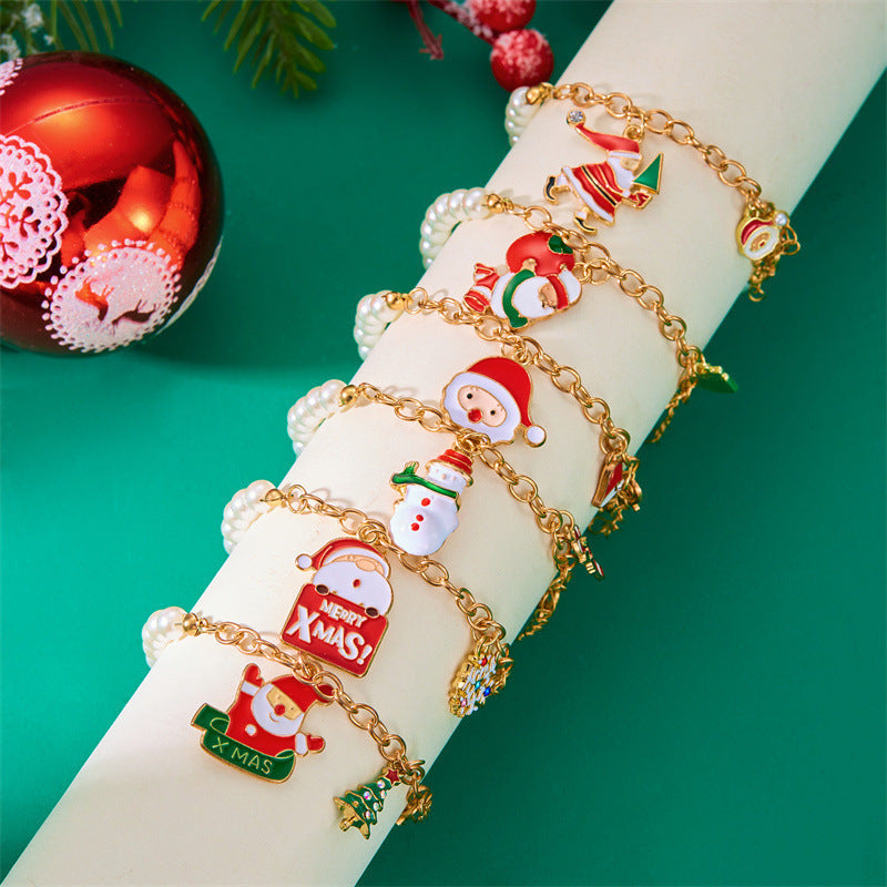 Pulsera de abalorios de Papá Noel de moda para mujer, chapada en aleación con acabado de esmalte, diseño de personaje de dibujos animados, joyería temática navideña