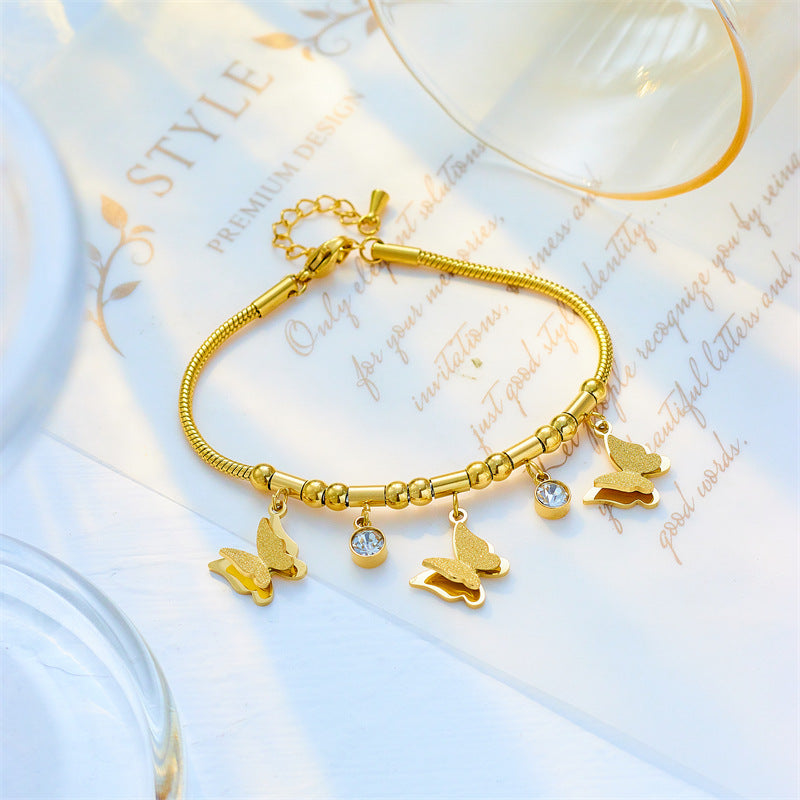Bracciale Minimalista in Acciaio al Titanio a Forma di Farfalla con Intarsio di Strass da Donna