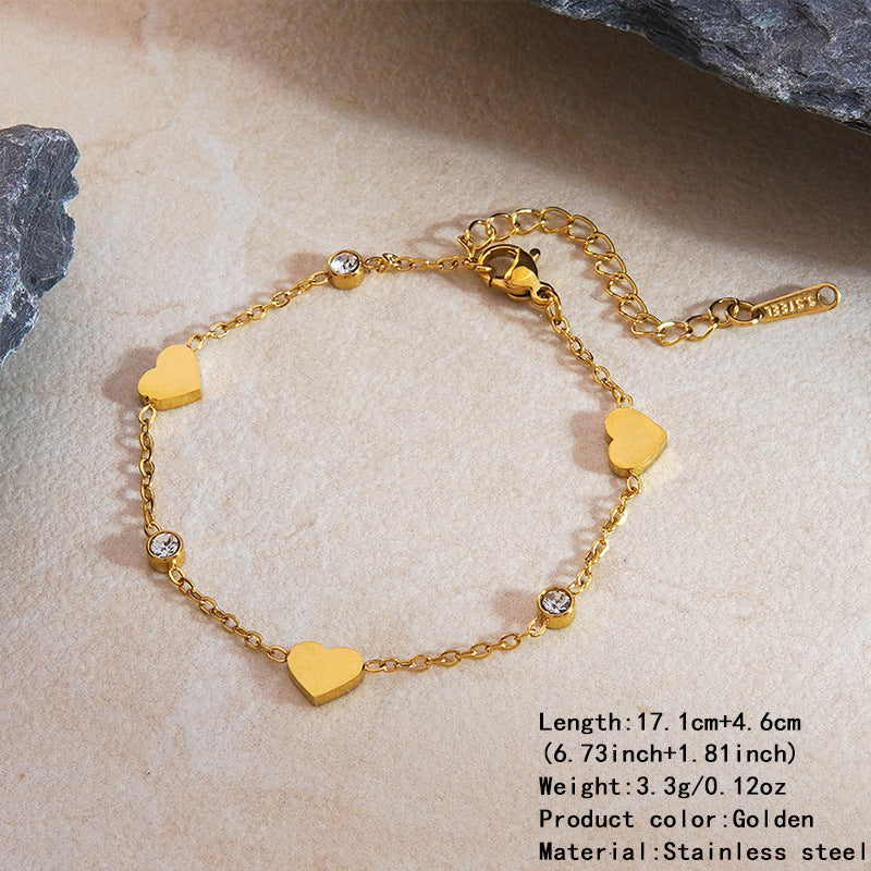 Elegante set collana e bracciale in oro 18 carati placcato con zirconi cubici a forma di cuore, catena in acciaio inossidabile e titanio per donne