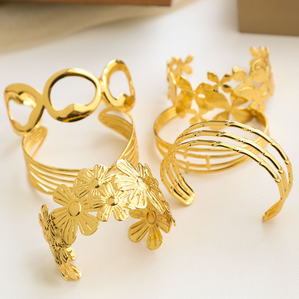 Bracciale Minimalista Ispirato alla Francia in Acciaio Inossidabile con Trafori a Motivi Floreali di Foglie e Girasoli