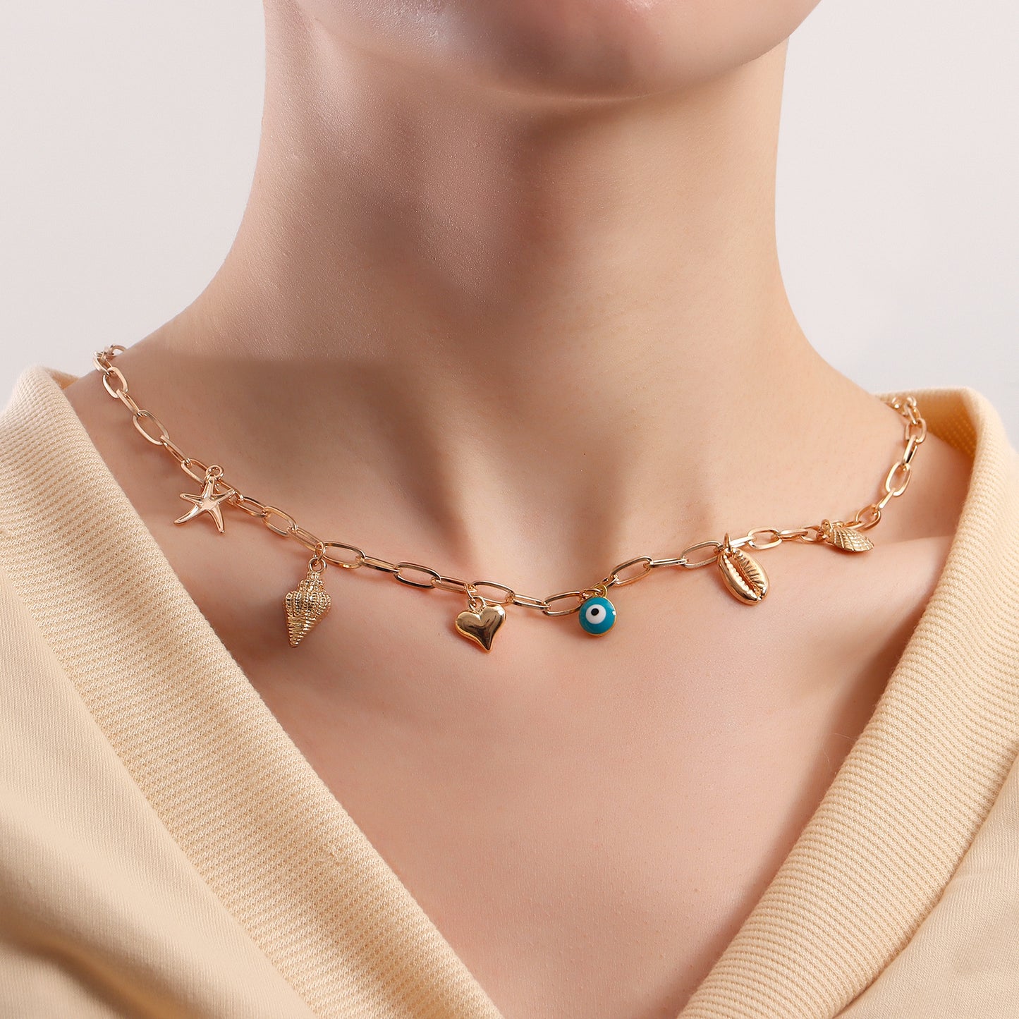 Minimalist Seashell and Starfish Pendant Necklace for Women with Geometric Shape Alloy Chain and Plated Finish