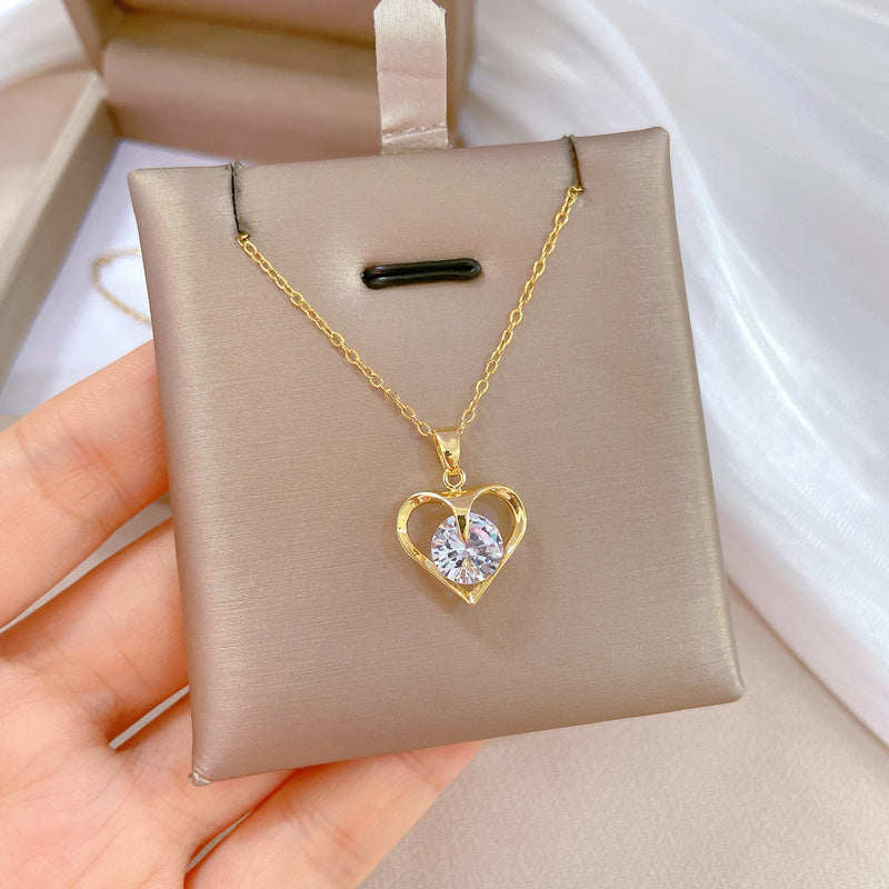 Collana con ciondolo a cuore in zircone in acciaio al titanio di lusso unisex