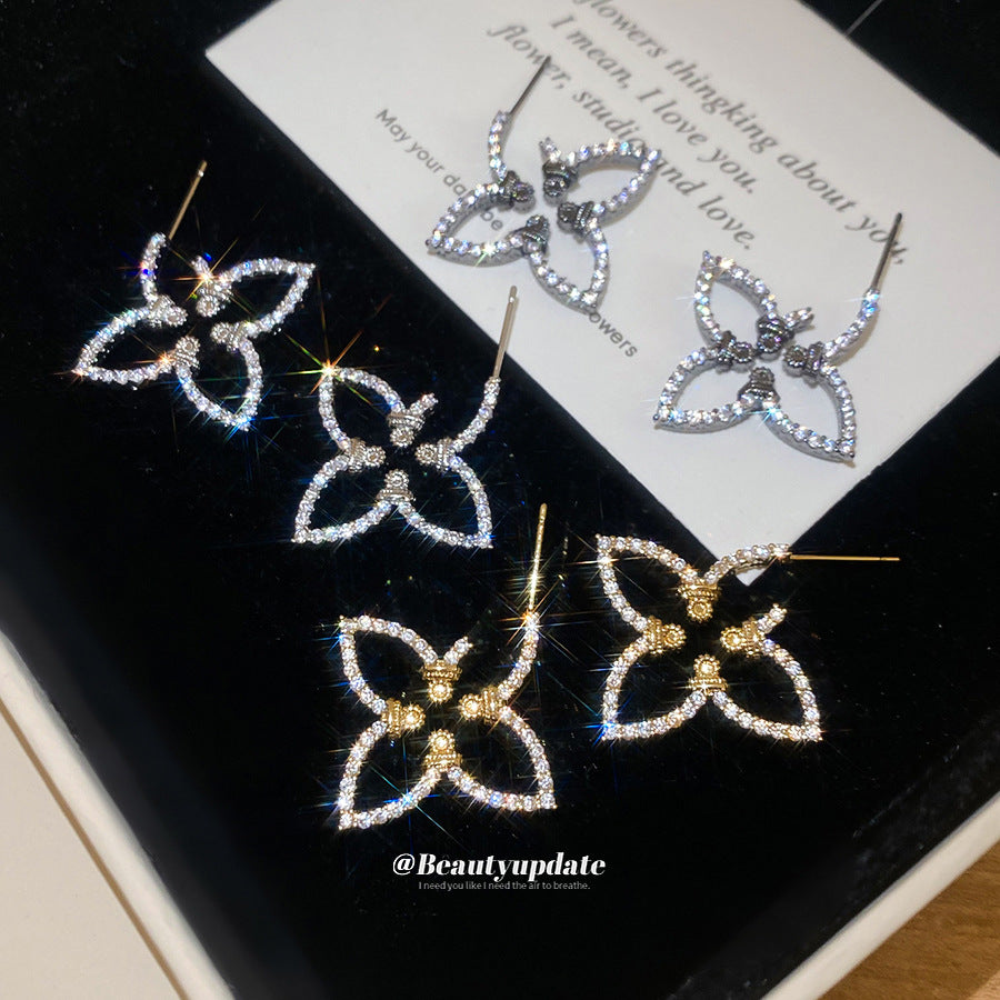 Pendientes florales minimalistas con incrustaciones de circonita en postes de acero inoxidable para mujer