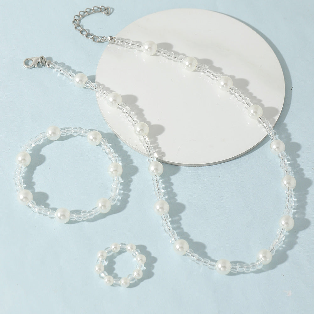 Juego de collar y pulsera de perlas con diseño de dibujos animados para niñas con cuentas de cristal transparente en un dulce y fresco diseño