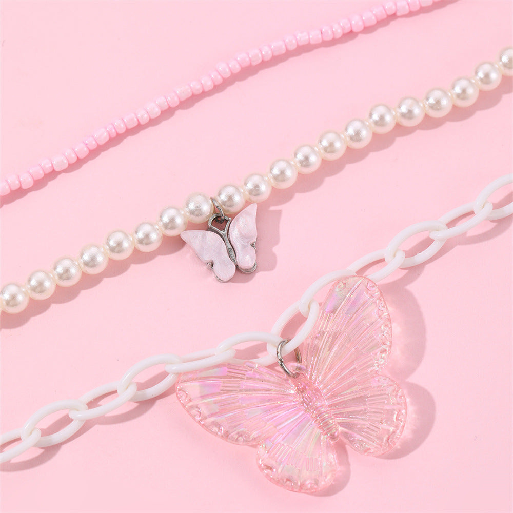 Set collana con ciondolo a farfalla rosa per bambine con ciondolo in resina e catena di perle in stile principessa per primavera ed estate
