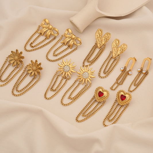 Elegantes aretes de acero inoxidable con forma de corazón y lazo, con borlas florales y acabado chapado