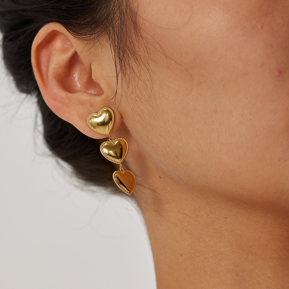 Pendientes de borla en forma de corazón de acero inoxidable con baño de oro de 18 quilates de moda con diseño de borde en capas para mujer