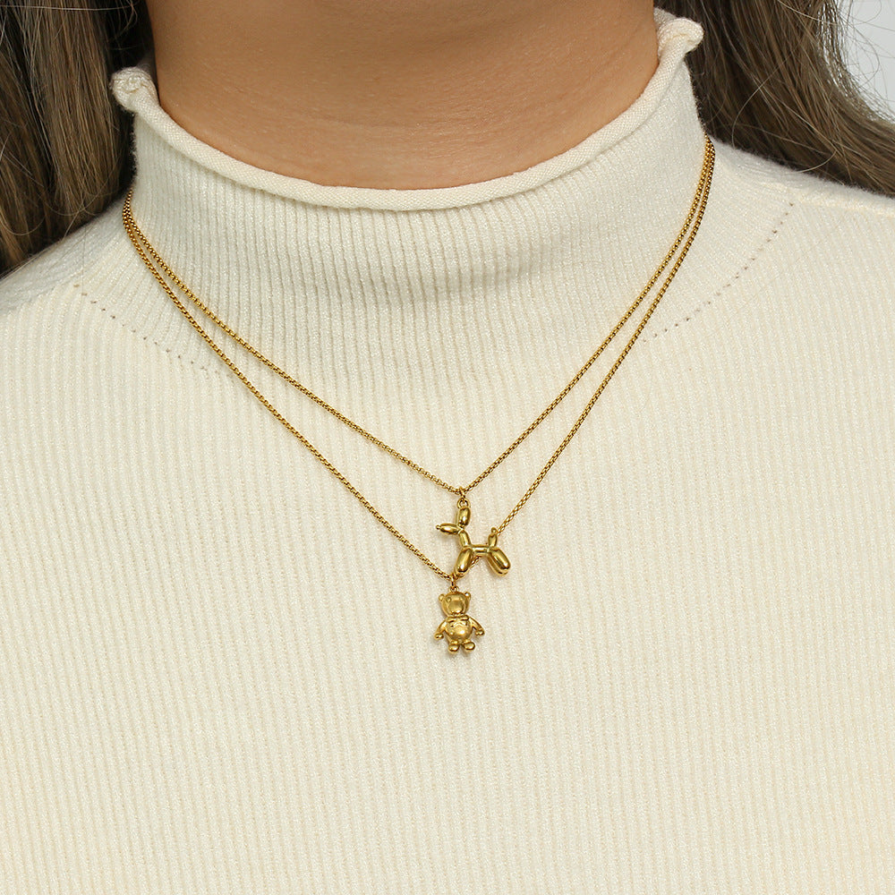Collar con colgante minimalista de perro globo en acero inoxidable con baño de oro de 18 quilates para mujer