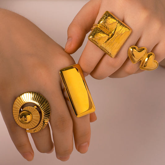 Minimalist Geometric Stainless Steel Ring with 18K Gold Plating for Women Featuring Smooth Polished Finish and Heart, Square, and Seashell Shapes