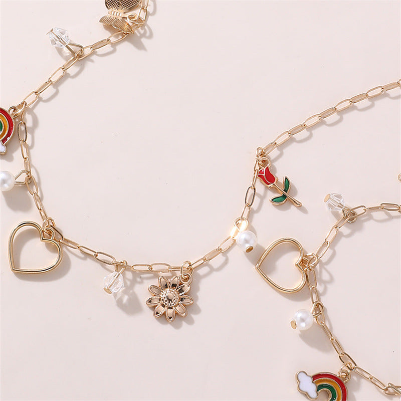 Collana con ciondolo a farfalla floreale e fiocco per bambine, lega di zinco, design a cuore, arcobaleno e rosa