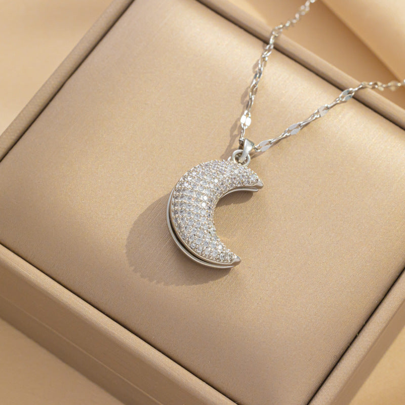 Collana di lusso in acciaio al titanio a forma di luna e cuore con perla e ciondolo a conchiglia su catena ondulata da donna