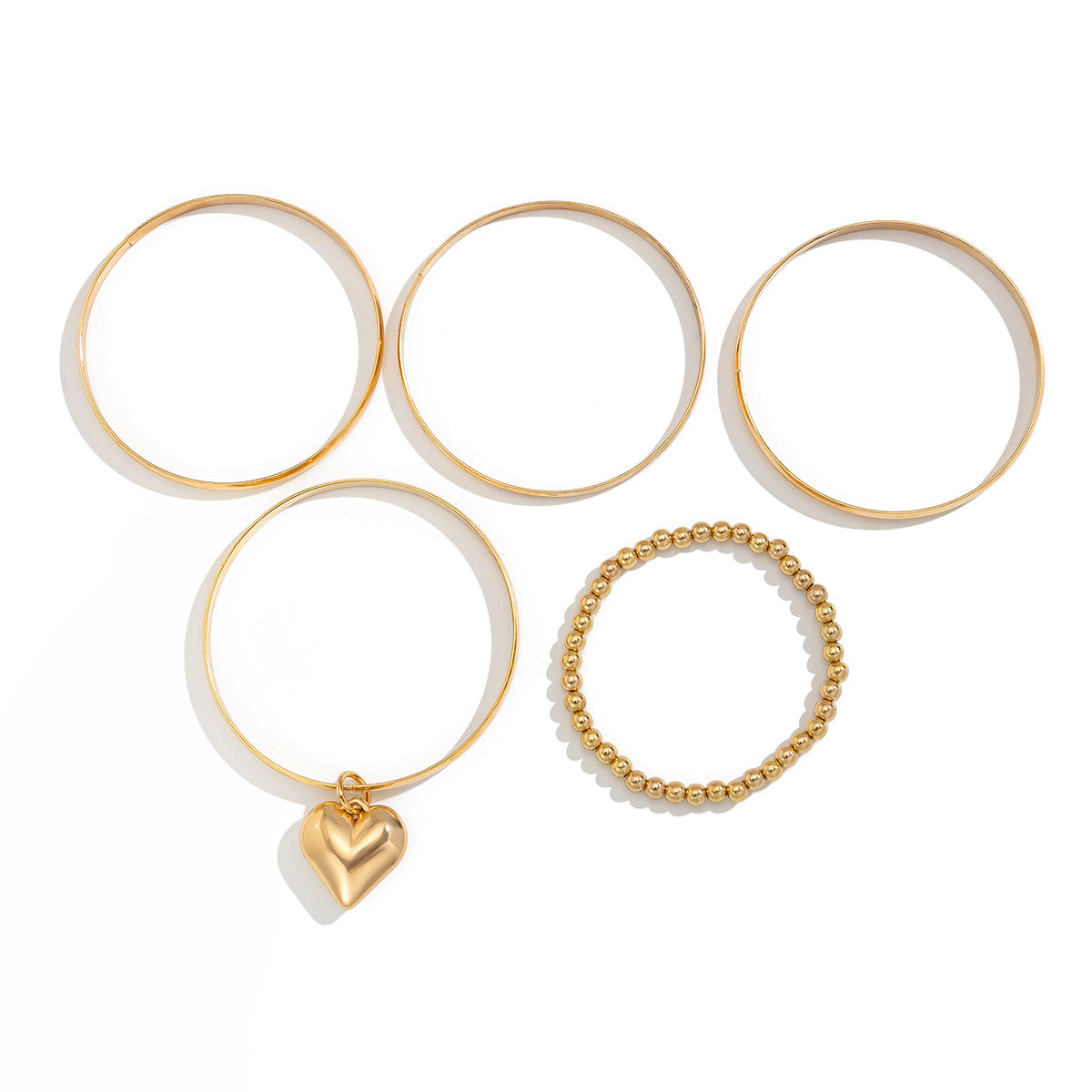 Set di bracciali con ciondolo a forma di cuore minimalista e perline di metallo placcato, per essere indossati in modo impilabile