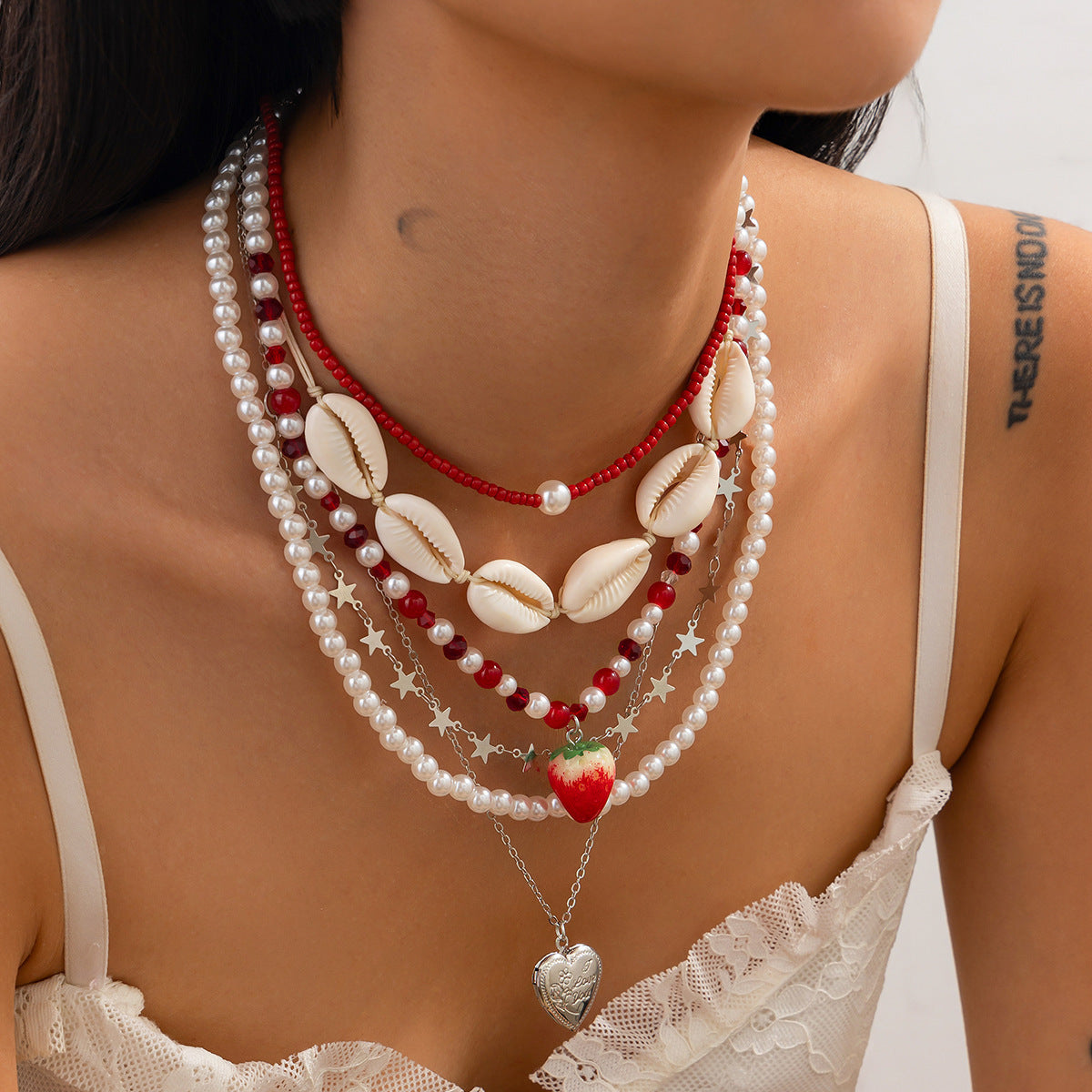 Set di collana da donna con conchiglie e perle a tema boho da spiaggia con ciondolo a cuore