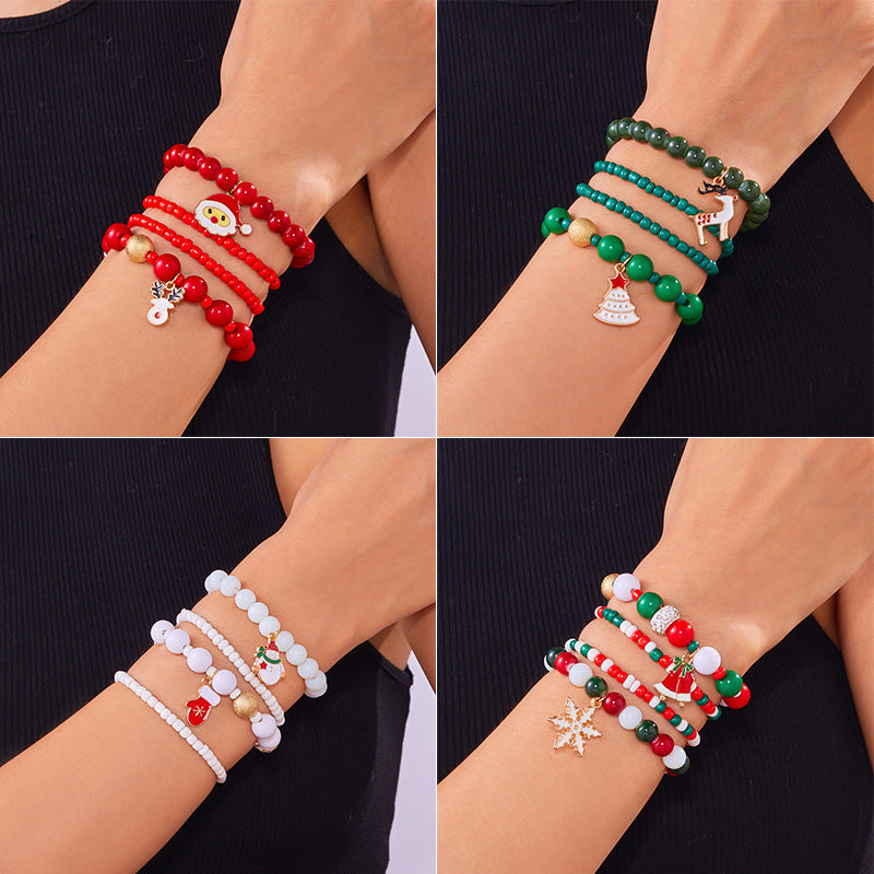 Bracciale da donna natalizio con pupazzo di neve e Babbo Natale in stile cartone animato, in lega di zinco con lavorazione artigianale