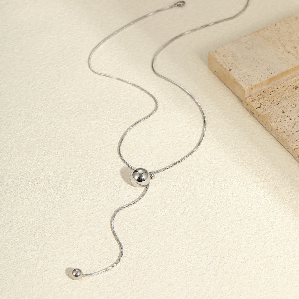 Collar con colgante geométrico minimalista de acero inoxidable con borla y cadena de serpiente para mujer