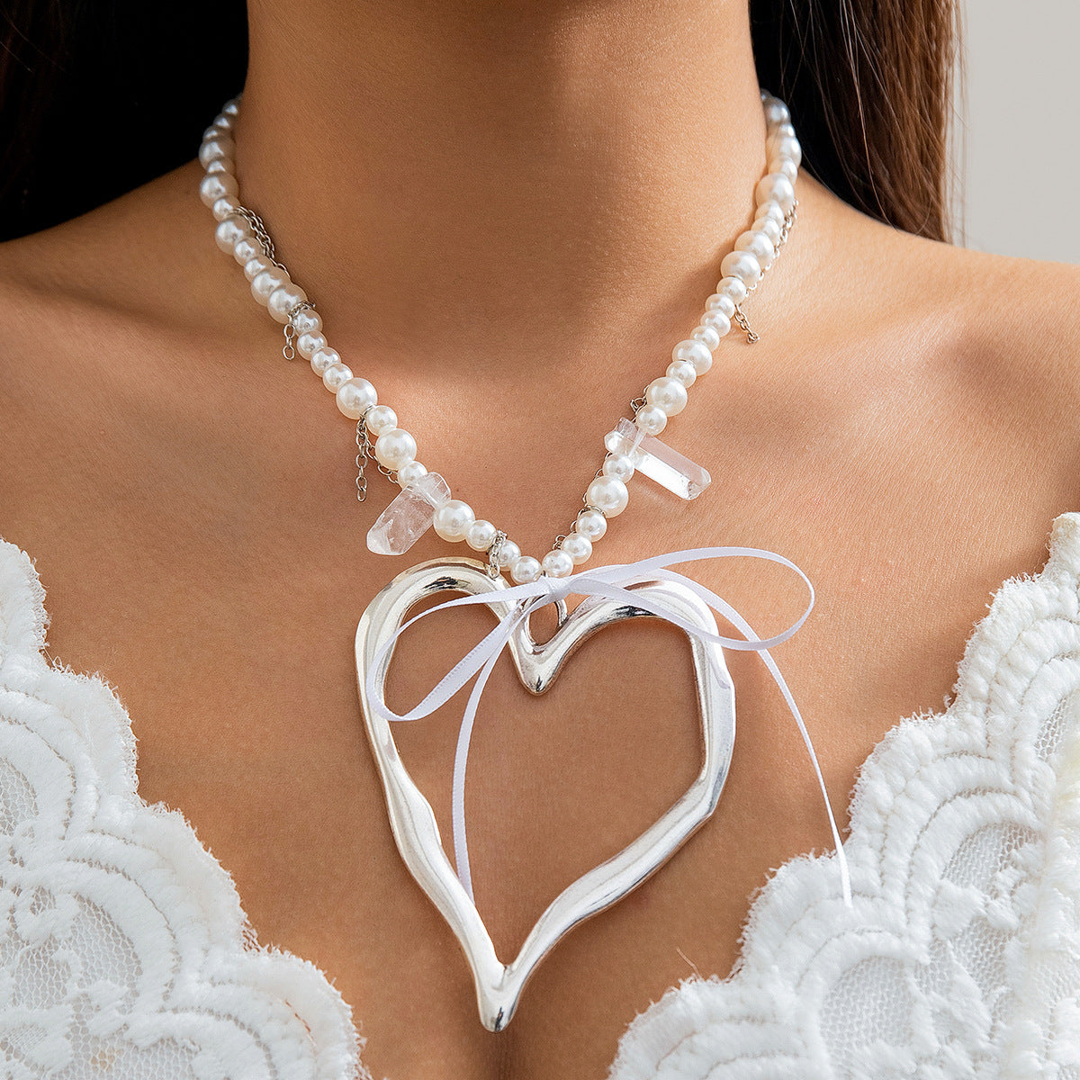 Collana da donna con ciondolo a cuore e fiocco in lega galvanizzata stile Ins