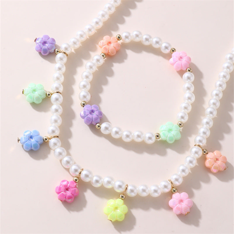 Dulce juego de collar y pulsera de cristal con nudo floral para niñas con colgante de aleación en colores pastel de helado