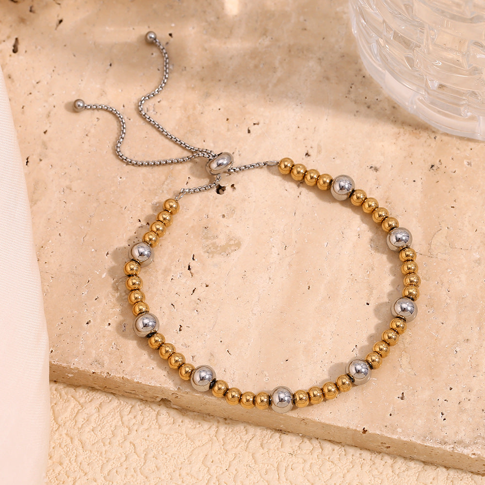 Elegante bracciale geometrico minimalista in acciaio inossidabile con placcatura in oro 18 carati e design regolabile con perline per donna