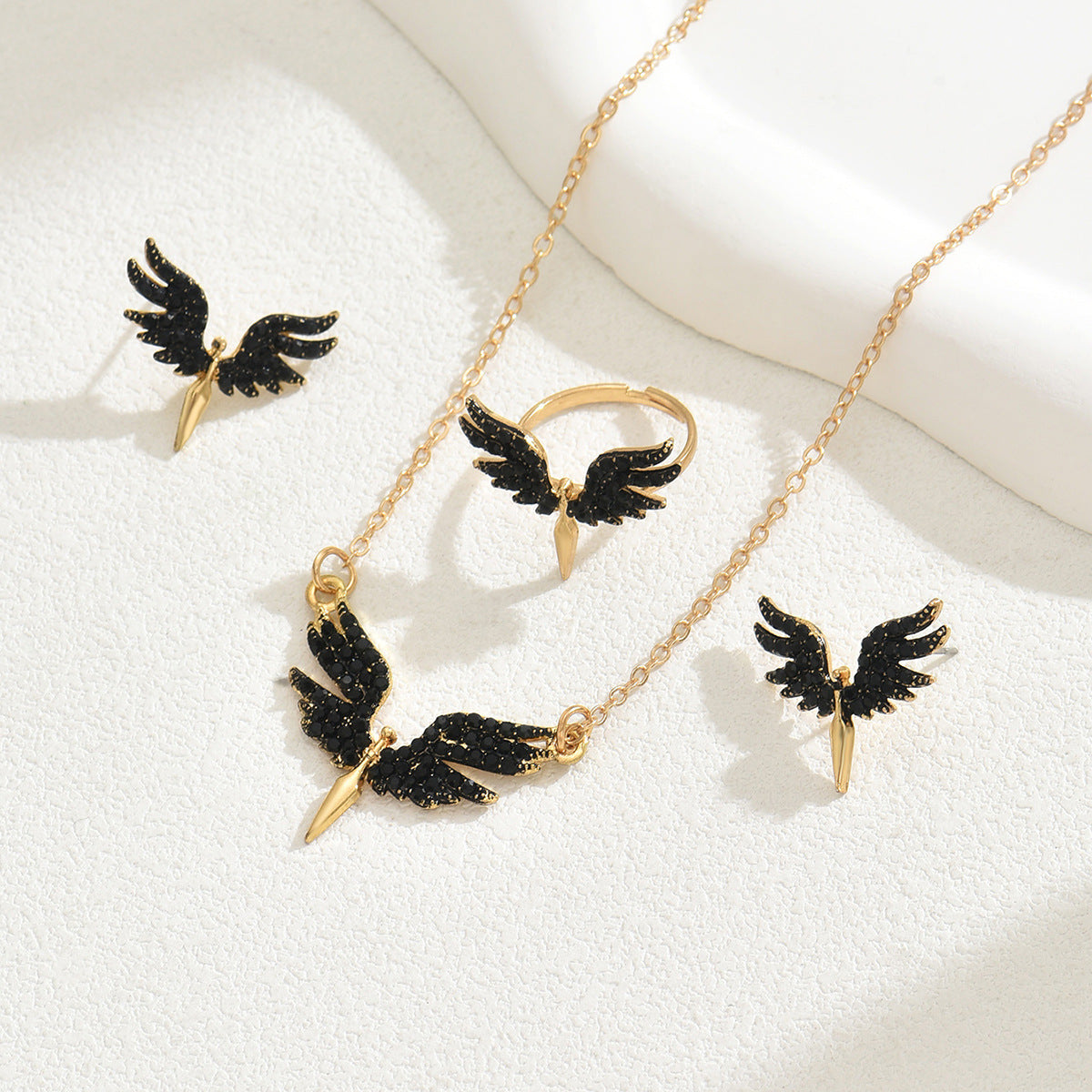Set collana, orecchini e bracciale in lega smaltata a forma di ala d'angelo, stile donna d'ufficio alla moda