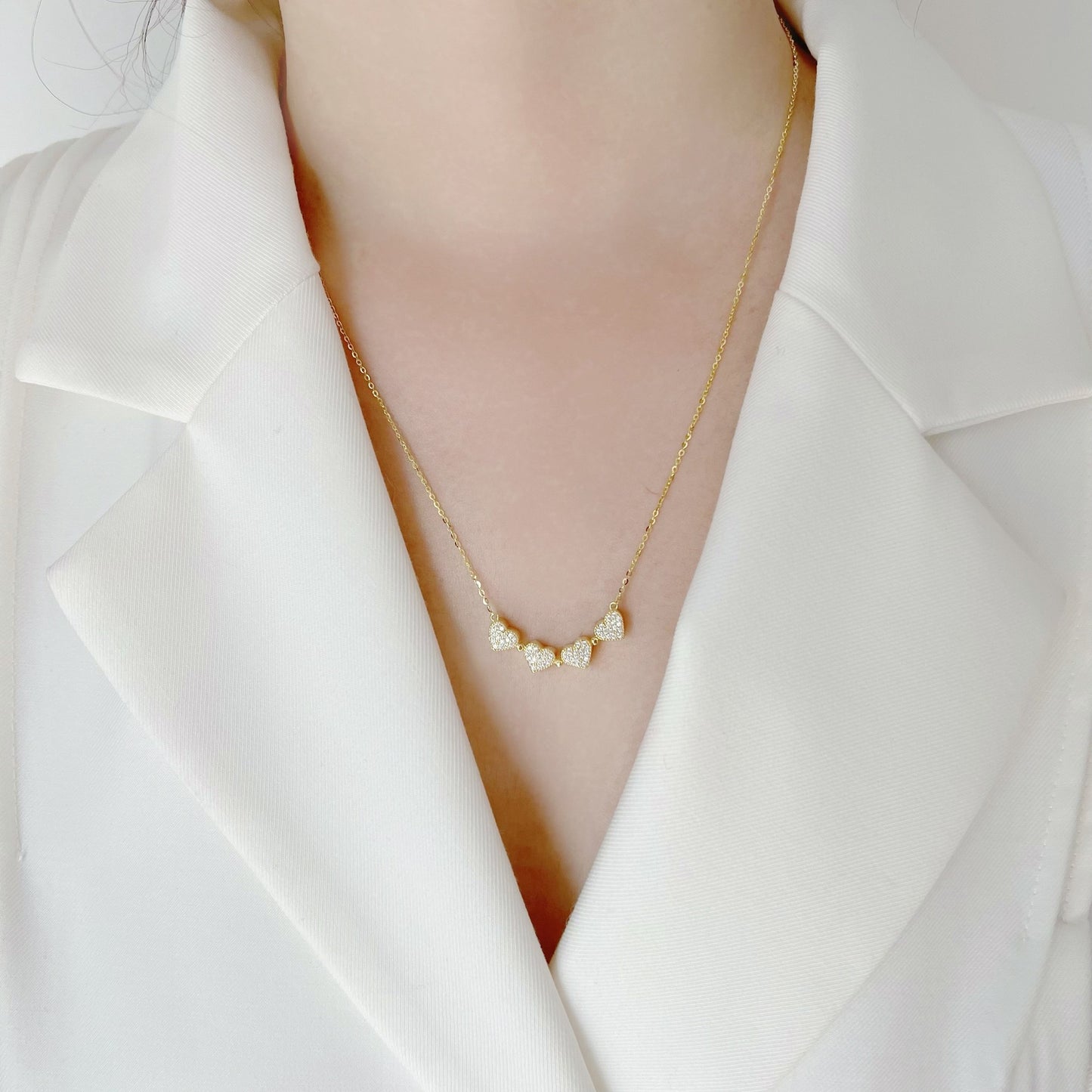 Minimalist Heart-Shaped Titanium Steel Pendant Necklace with Four-Leaf Clover Design, Double-Sided Wearable, Electroplated Finish, Delicate Clavicle Chain for Women